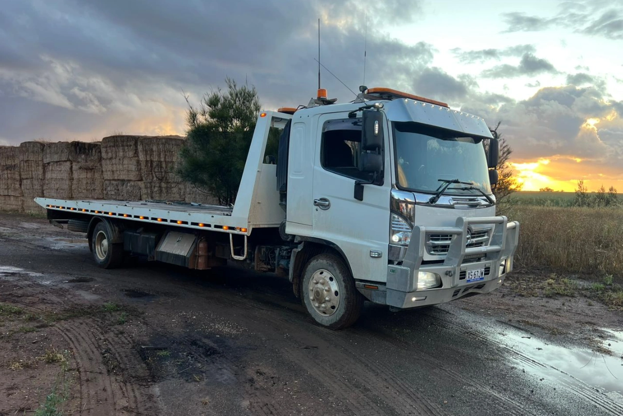 Tilt truck towing